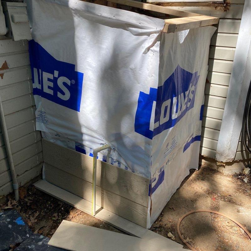 Exterior water heater shed framed with weather wrap Exterior water heater shed framed with weather wrap