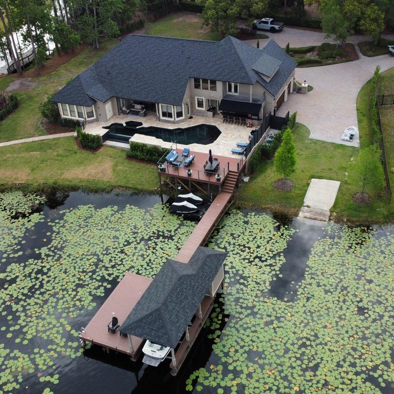 Owens Corning Onyx Black shingle roof on lakeside home