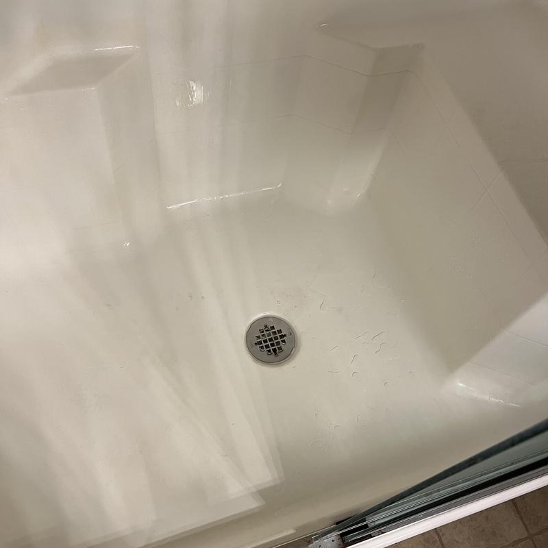 Shower drain flange installed in master shower pan Shower drain flange installed in master shower pan