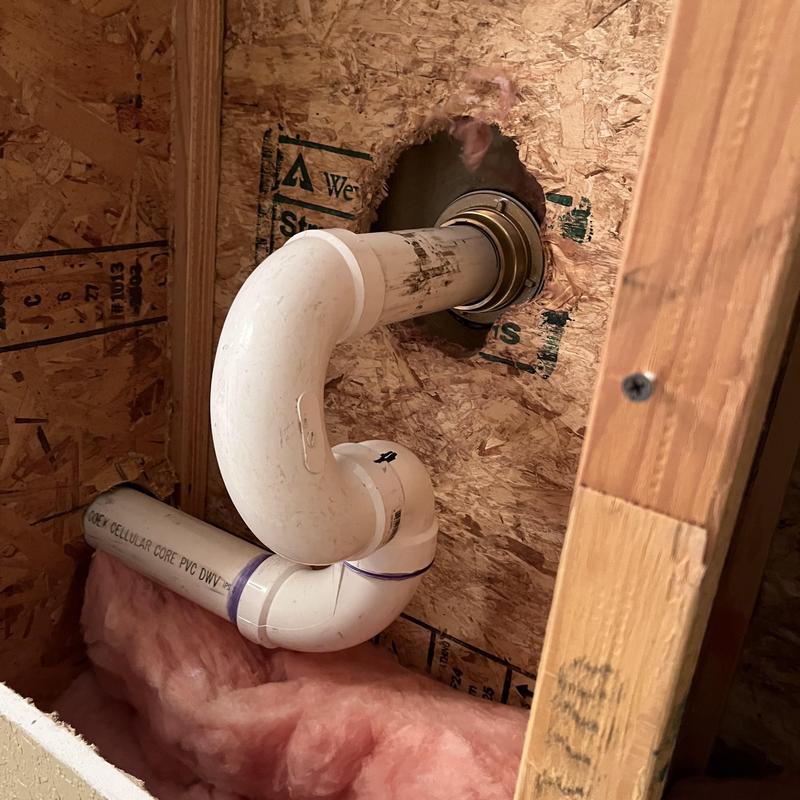 Shower flange and PVC drain pipe installation in wall Shower flange and PVC drain pipe installation in wall