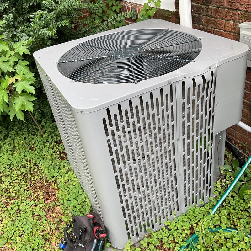 Condenser coil and air conditioner unit outdoors Condenser coil and air conditioner unit outdoors