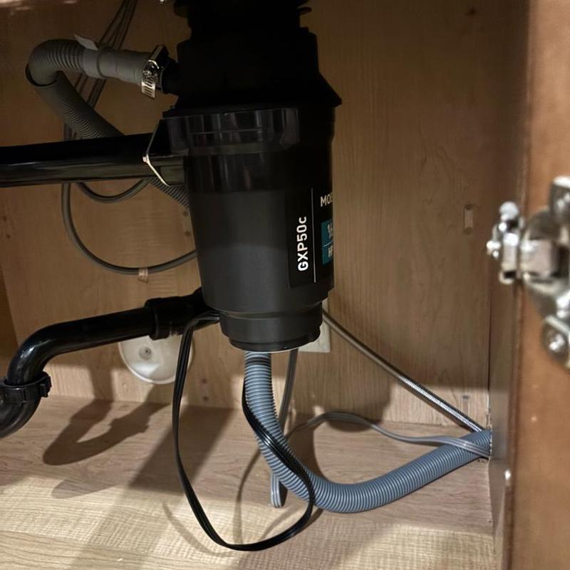 Garbage disposal installed under kitchen sink in Mesa, AZ Garbage disposal installed under kitchen sink in Mesa, AZ