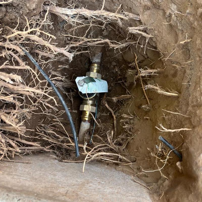 1-inch pressure regulator valve installed in ground hole 1-inch pressure regulator valve installed in ground hole