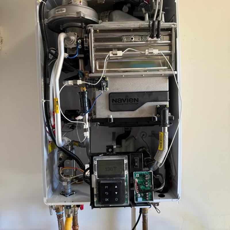 Navien tankless water heater internal components exposed Navien tankless water heater internal components exposed