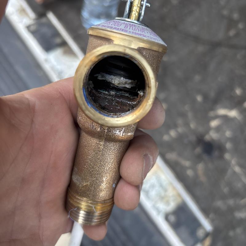 Water heater T&P relief valve corrosion close-up