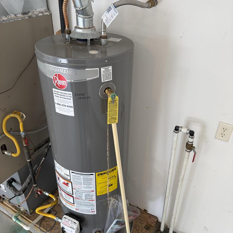 Water heater with new T&P valve and expansion tank