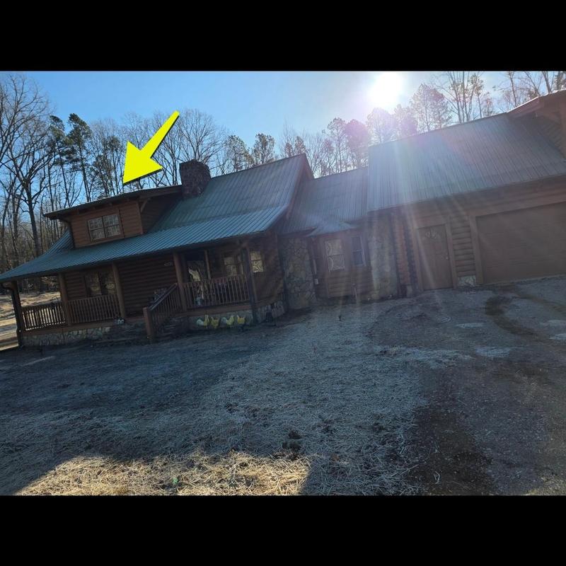 Metal roof with dormer inspection on log home