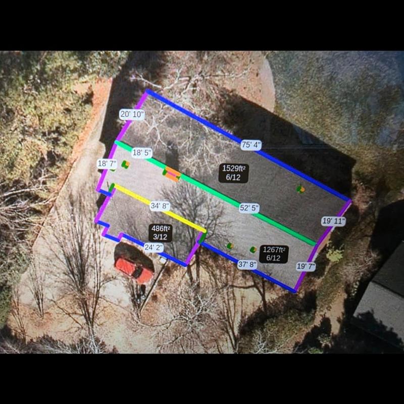 Roof system aerial measurements with area and pitch details