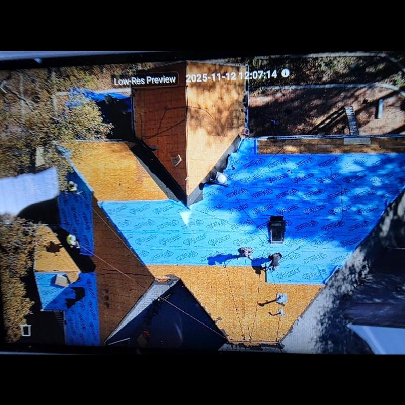 Roofing underlayment installation on residential roof