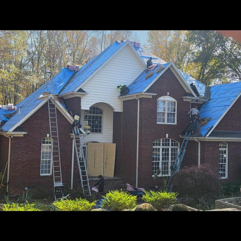 Residential roof underlayment installation with ladders