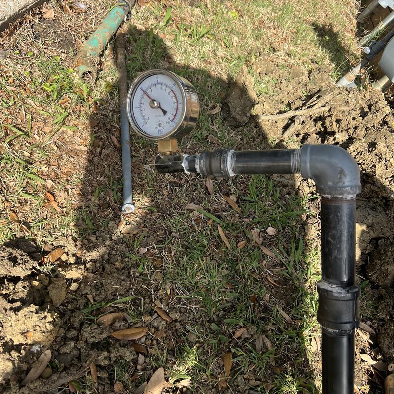 Main gas line with pressure gauge and shutoff valve