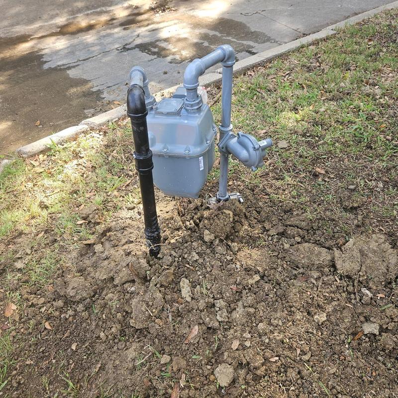 Main gas line with shutoff valve and risers