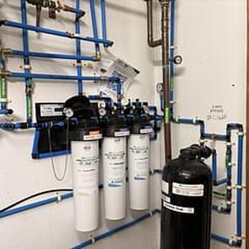 Filtered water system with pressure gauges and pipes