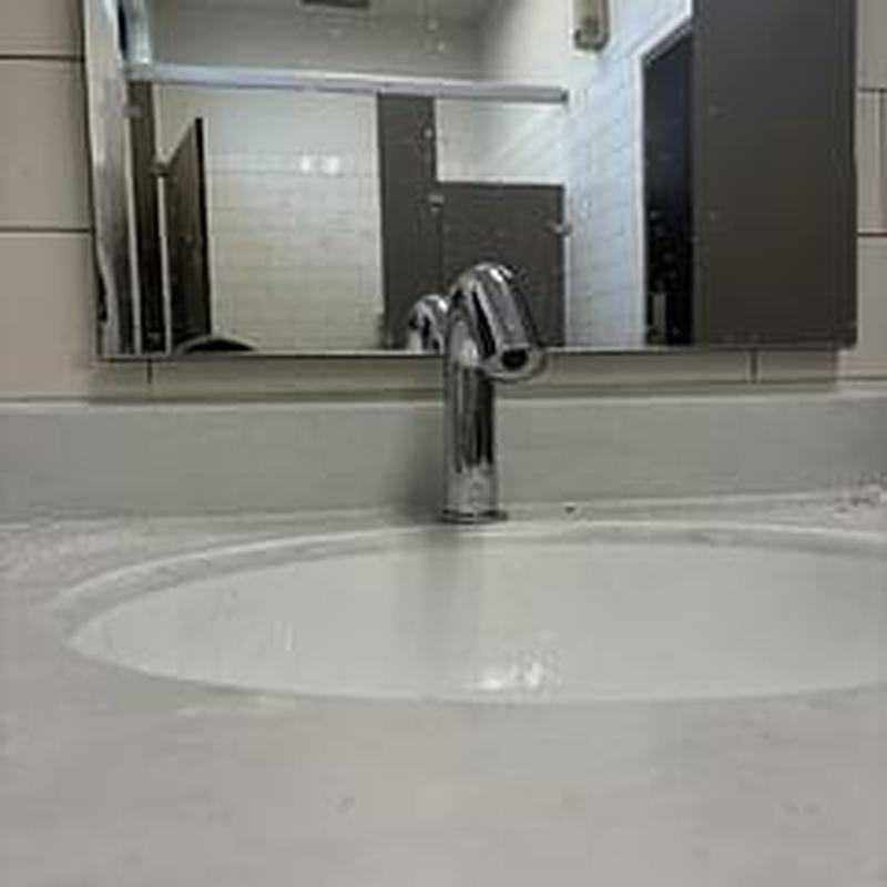 Toto hands-free auto faucet in men's room sink