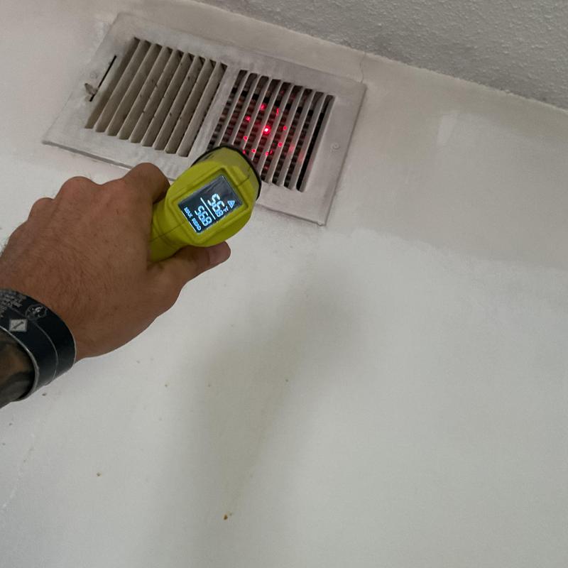 Air vent temperature check with infrared thermometer Air vent temperature check with infrared thermometer