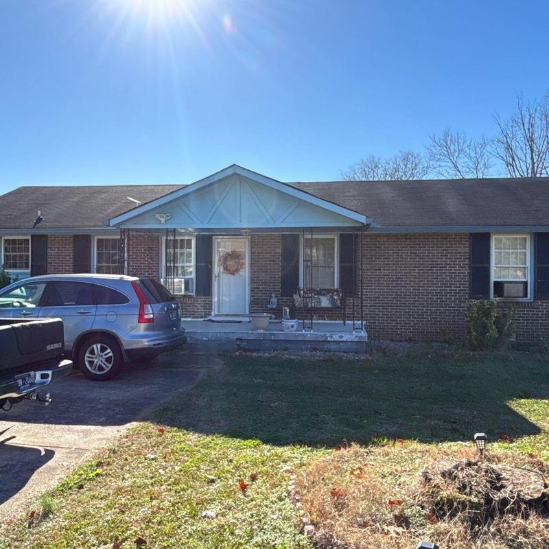 Asphalt shingle roof with hail damage inspection