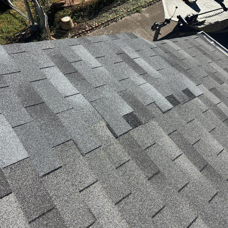 Asphalt shingles with hail damage on residential roof