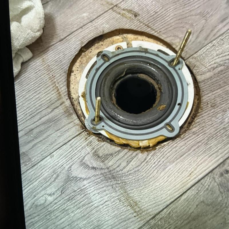 Toilet flange and wax ring installation on floor