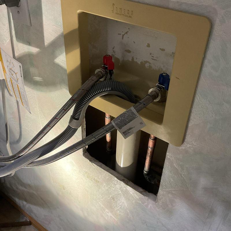 Washing machine valves with supply lines installed