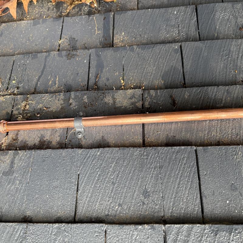 Type L copper cold waterline on house exterior deck