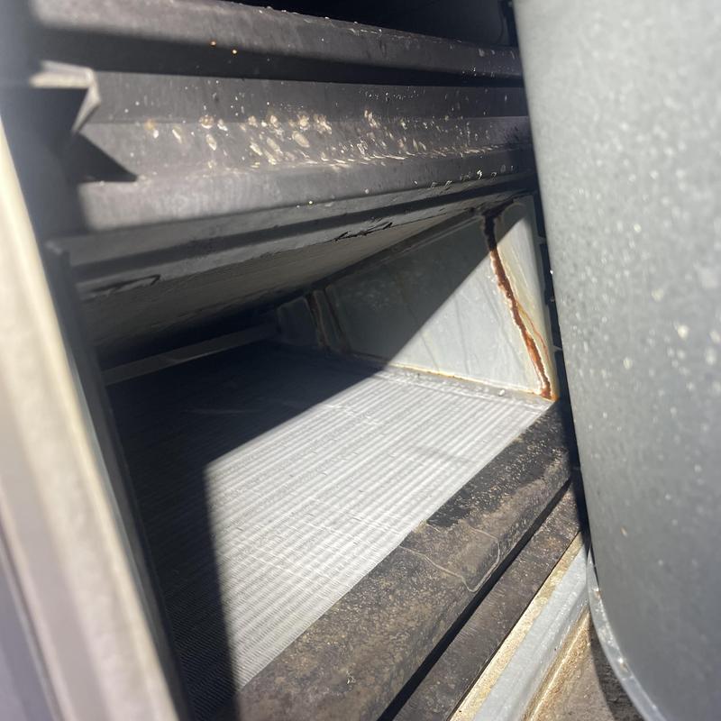 Evaporator coil casing with mold and rust buildup Evaporator coil casing with mold and rust buildup