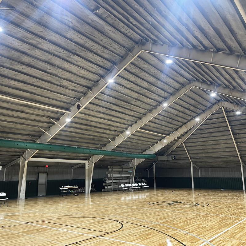 HVAC drain line clearing in commercial gym ceiling