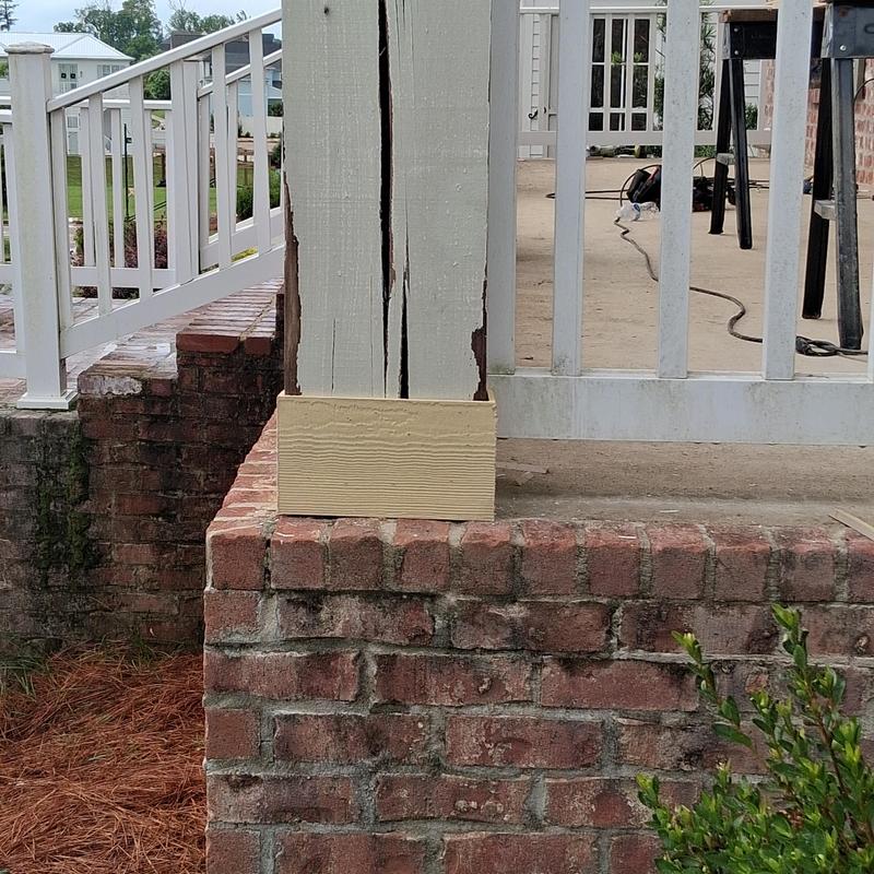 Hardie board wrap on porch column base with brick base