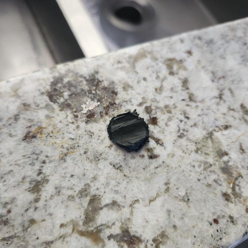 Garbage disposal dishwasher drain plug in countertop