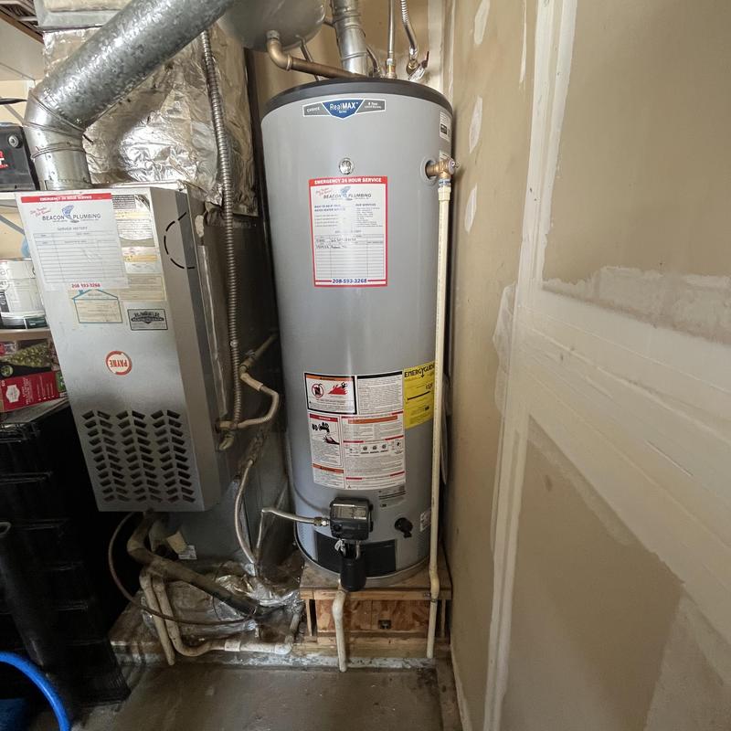Gas water heater with expansion tank and supply lines Gas water heater with expansion tank and supply lines