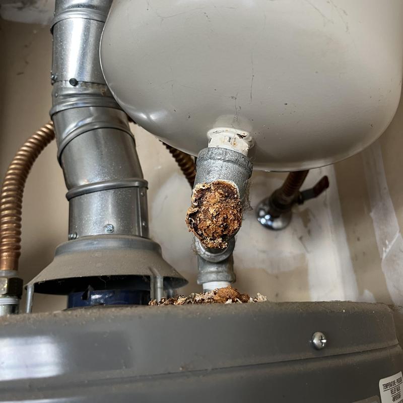 Gas water heater corroded pipe detail and expansion tank Gas water heater corroded pipe detail and expansion tank