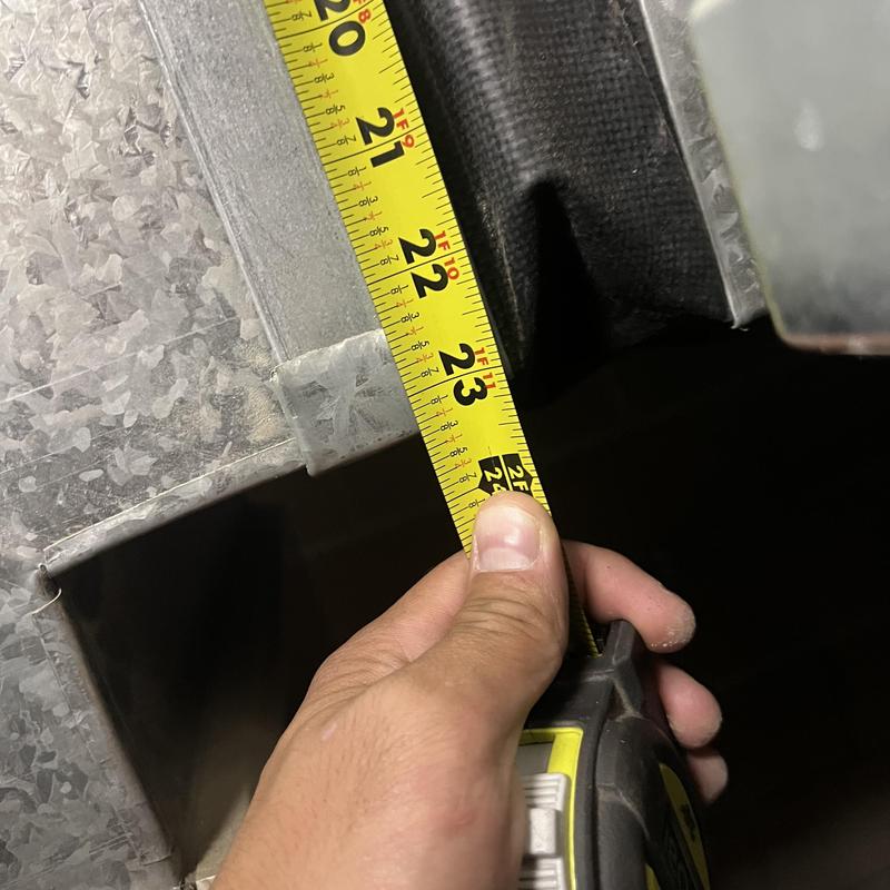 Furnace duct measured with tape measure Furnace duct measured with tape measure