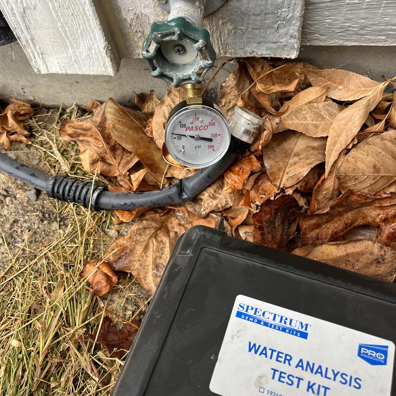 Water pressure gauge and water analysis test kit outdoors Water pressure gauge and water analysis test kit outdoors