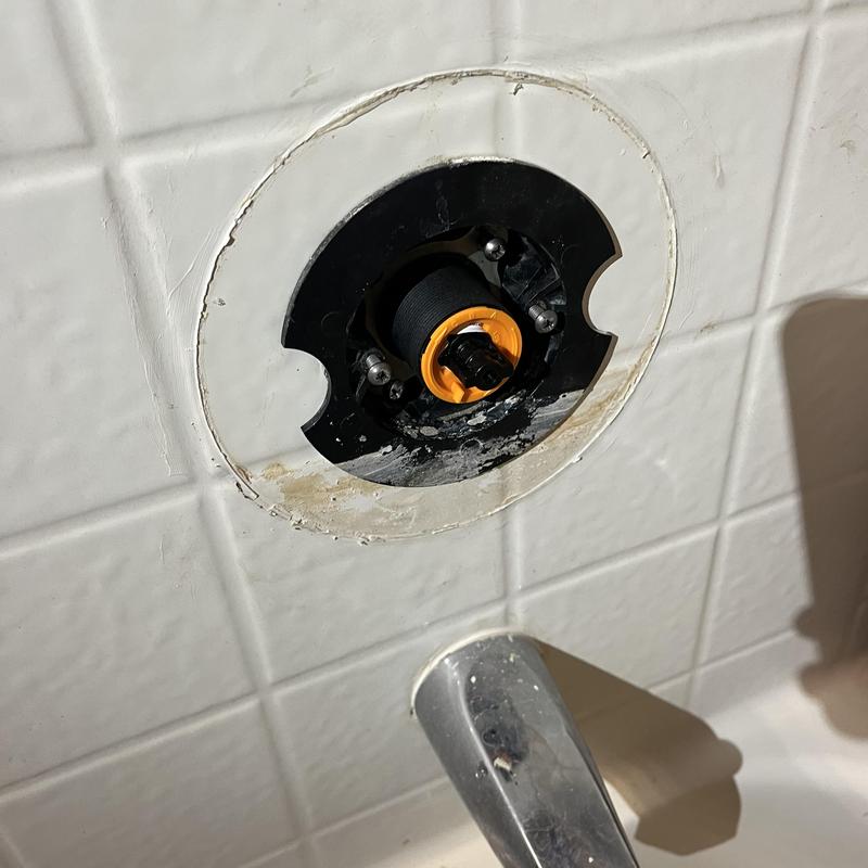 Shower valve cartridge removed for replacement Shower valve cartridge removed for replacement