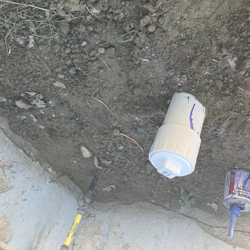 Sewer main pipe with two-way cleanout outside footing Sewer main pipe with two-way cleanout outside footing