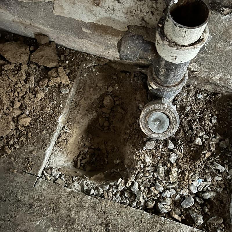 Sewer main pipe with two-way cleanout excavation Sewer main pipe with two-way cleanout excavation
