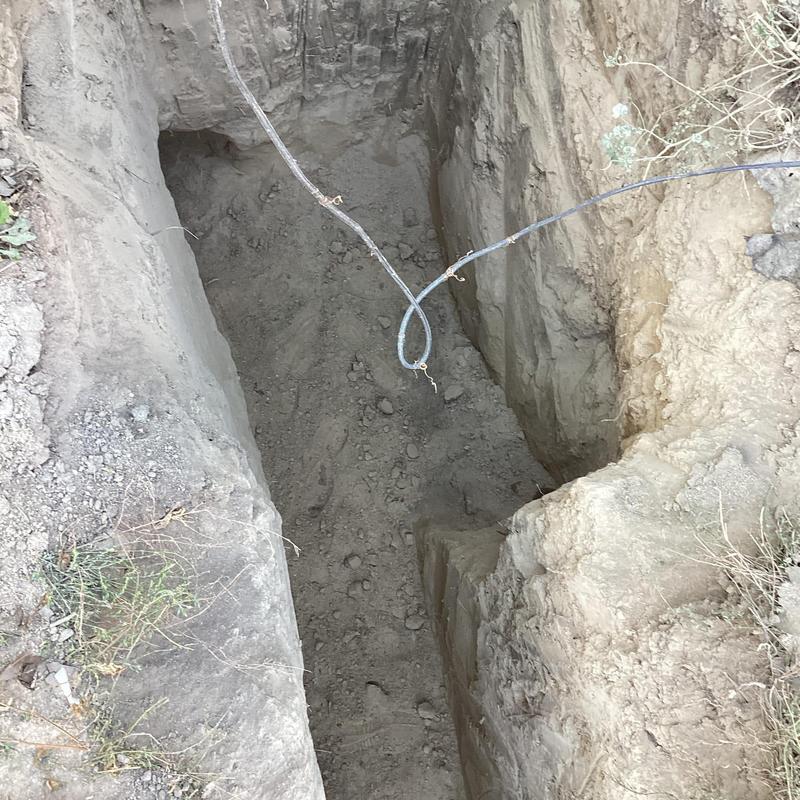 Sewer main trench excavation near home footing Sewer main trench excavation near home footing