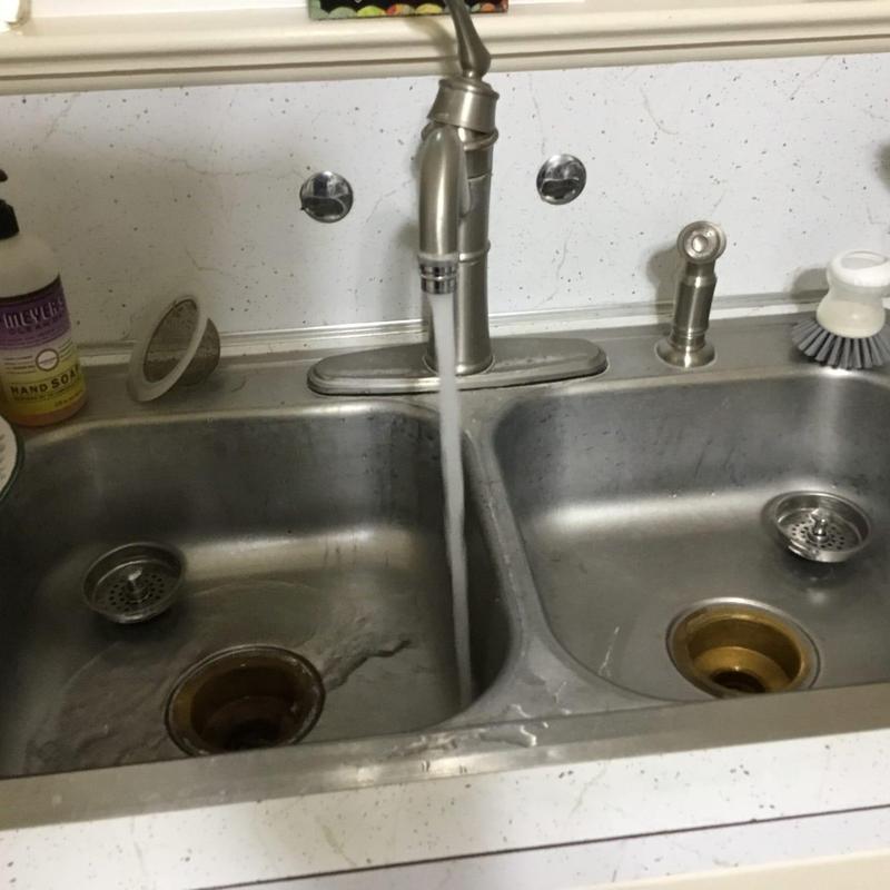 Sink drain with cable line clearing blockage under trap adapter