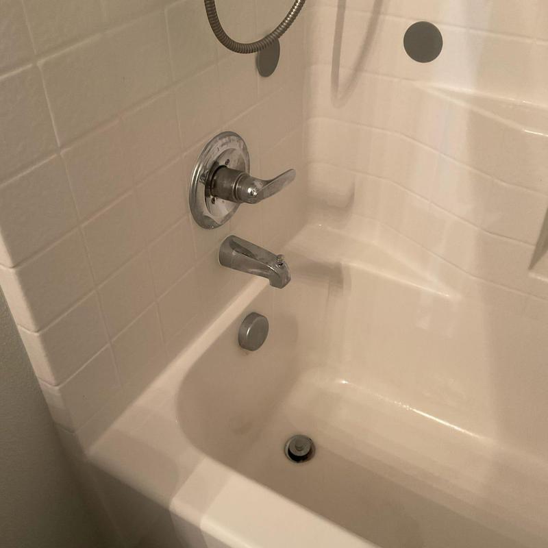 Tub shower faucet cartridge replacement in bathroom Tub shower faucet cartridge replacement in bathroom