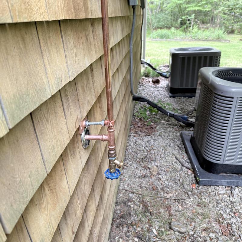 Silcock main with new valve on house exterior