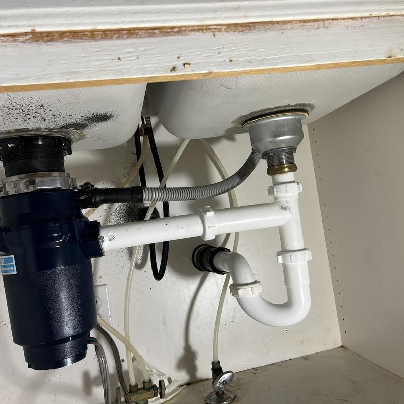Garbage disposal and sink drain plumbing installation Garbage disposal and sink drain plumbing installation