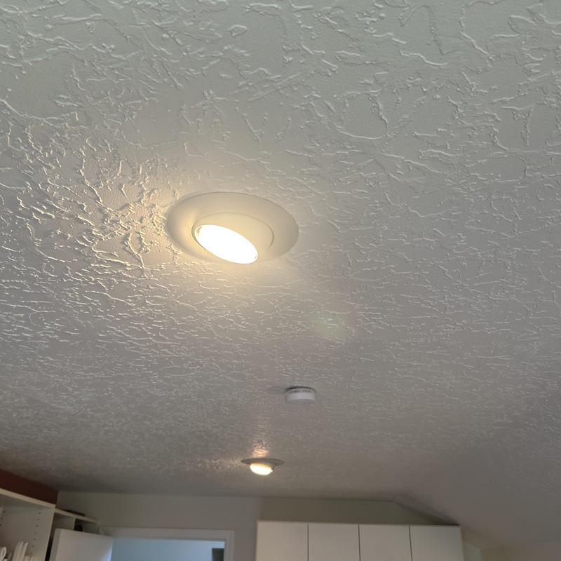 Ceiling recessed light fixtures with wall switches in living room