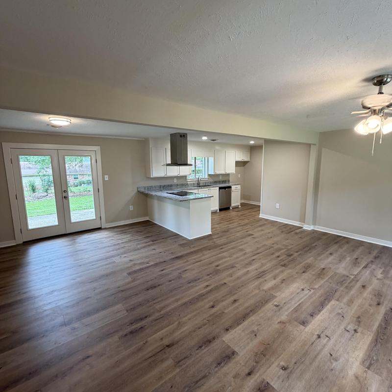 Kitchen flooring and cabinets in remodeled home