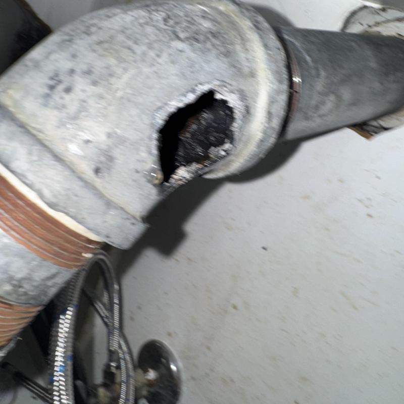 Galvanized drain pipe with large corrosion hole