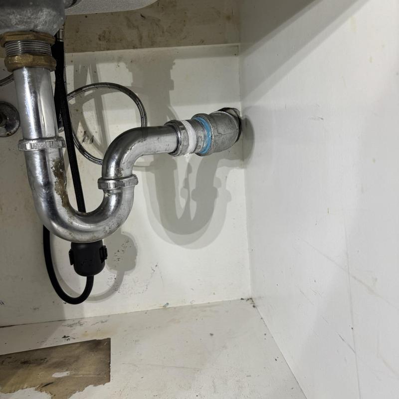Galvanized drain line and fittings under sink