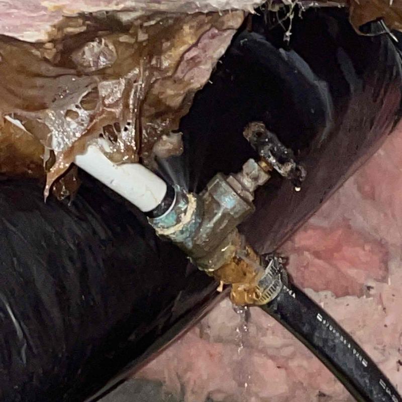 Gate valve and pipe leak in crawl space plumbing Gate valve and pipe leak in crawl space plumbing