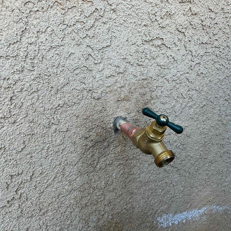 12-inch MIP hose bib with threaded connection installed