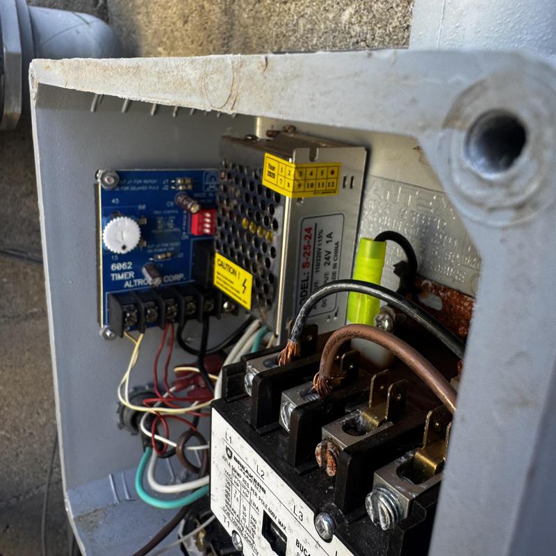 Pool pump breaker wiring and control board inside panel