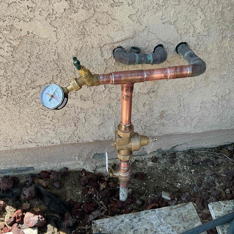 Pressure regulator with shut-off valve on copper piping