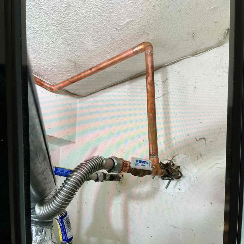Copper water supply piping with flexible connector installation
