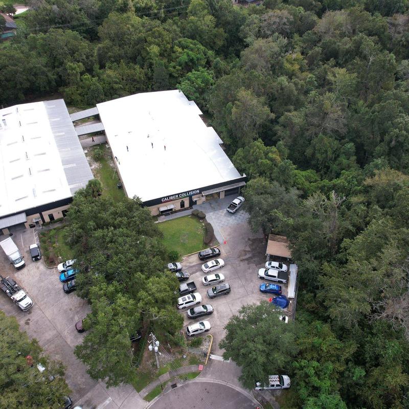 Commercial metal roof with new rolled insulation Commercial metal roof with new rolled insulation